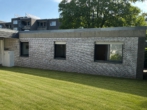 Garten - KI Modus - so könnte es aussehen - Familienfreundlicher Bungalow mit Garage in Mönchengladbach – Venn zu verkaufen