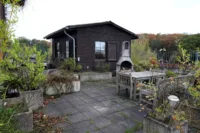Dachterrasse mit Gartenhaus