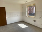Küche Foto 2 - 84 m² große Erdgeschosswohnung mit großer Sonnenterrasse und modernem Duschbad