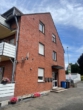 Hausgiebelseite - 84 m² große Erdgeschosswohnung mit großer Sonnenterrasse und modernem Duschbad