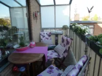 Überdachter Balkon