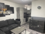 Wohn-Schlafbereich mit Blick in die Küche - Gemütliches, möbliertes 1-Zimmer-Apartment mit Balkon in ruhiger Lage nahe Borussia-Park